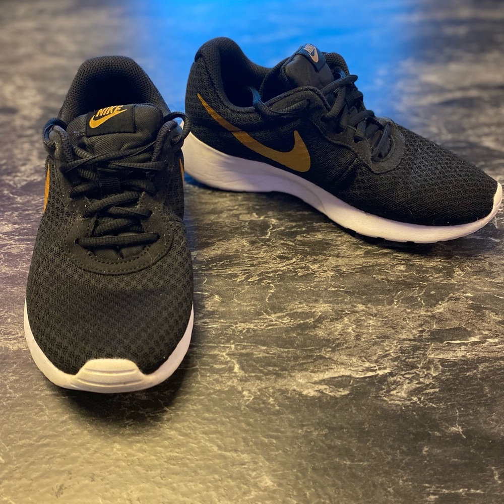 Nike Black Mesh Sneakers with Gold Swoosh